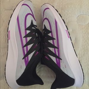 Grey black and purple Nike’s